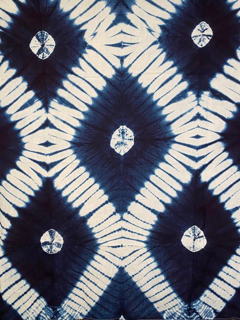 "Hand-dyed Indigo scarf made of a lightweight cotton fabric. May be styled as a shawl, or as a sarong. 45\" Wide 52\" Long We source these fabrics directly from the artists in Mali. This fabric is dyed with tie and dye, known as Shibori. Each piece is unique and one of a kind." Shibori Dyeing, Tye Dye Patterns, Diy Tie Dye Designs, Fabric Dyeing Techniques, Indigo Dyed Fabric, Indigo Pattern, Motifs Textiles, Shibori Pattern, Shibori Print