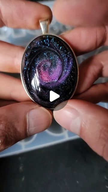 Daniel Cooper on Instagram: "Galaxy technique #252 on my YouTube   This piece was made over 2 years ago and has proven difficult to make again. In #252 on my YouTube channel, I try again and show the process in how to make these stunning resin art jewelry pendants.  Resin art, resin, jewelry making, galaxy, epoxy, epoxy art, jewelry.  #resinart #resin #jewelrymaking" Pastel, Galaxy Resin Pendant, Galaxy Resin Keychain, Galaxy Epoxy, Resin Techniques, Resin Art Jewelry, Galaxy Resin, Galaxy Jewelry, Epoxy Art