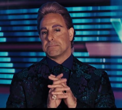 Caesar Flickerman, Catching Fire Hunger Games Ceaser Flickerman, Caesar Flickerman Aesthetic, Ceaser Flickerman, Caesar Flickerman, Hunger Games Capitol, Hunger Games Tributes, Stanley Tucci, Light Film, Literature Books