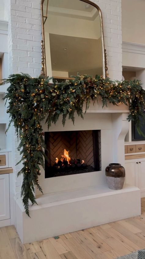 Shop Majestic Holiday Garland and other curated products on LTK, the easiest way to shop everything from your favorite creators. Natal, Outdoor Fireplace Christmas Decor, Neutral Christmas Decor Living Room, Garland On Mirror Christmas, Fireplace Garland Everyday, Mantle Garland Everyday, Modern Christmas Garland, Mantle Christmas Garland, Christmas Outdoor Decorating