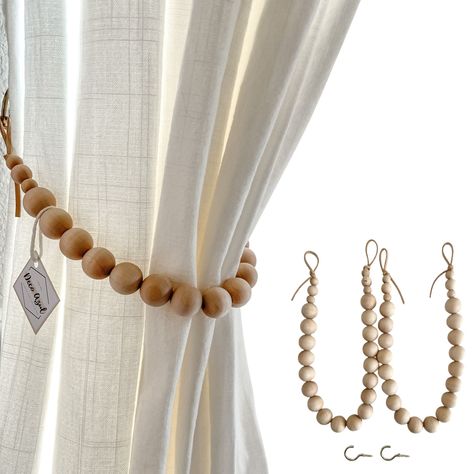 PRICES MAY VARY. Package includes: 2 curtain tiebacks. Materials: wooden beads, suede/leather cord. Color options: Natural Birchwood beads or handpainted black beads. Easy to install: 2 brass hooks included for your convenience. Modern design: natural look, perfect for living room, dining room, kitchen, bedroom, nursery, home office or studio. Handmade in USA. Family owned business. These beautiful wood bead curtain tiebacks are a perfect addition to your home. They will hold back your curtains Boho Curtain Tie Backs, Wood Bead Curtain, Woodland Curtains, Bead Curtain, Curtain Rod Holders, Wood Curtain, Curtain Holdbacks, Curtain Holder, Curtain Tiebacks
