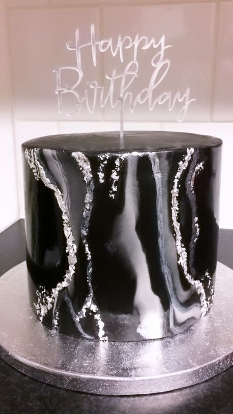 Black and white marble fondant cake with specs of edible silver leaf. Simple but elegant #blackcake #blackandsilvercake #marblefondant @calizaskitchencakes Black White And Silver Cake Ideas, Black White And Silver Birthday Theme, Silver And Black Birthday Cake, Birthday Cake Black And Silver, Birthday Cake For Women Black, Black And White Cake Aesthetic, Silver And Black Cake, Black And White Cake Ideas Birthday, Black And Silver Birthday Theme