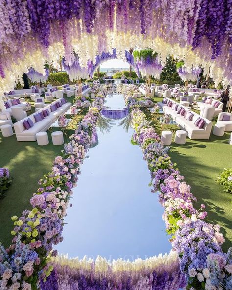 Dubai Weddings & Events on Instagram: "Immersing into the beauty of a blossoming garden 🌸" Wedding Venue Entrance Decor Walkways, Purple Wedding Theme Receptions, Wedding Reception 2024, Big Event Ideas, Wedding Places Aesthetic, 2024 Wedding Theme, Purple Theme Wedding Decorations, Cool Wedding Themes, Lavender Indian Wedding