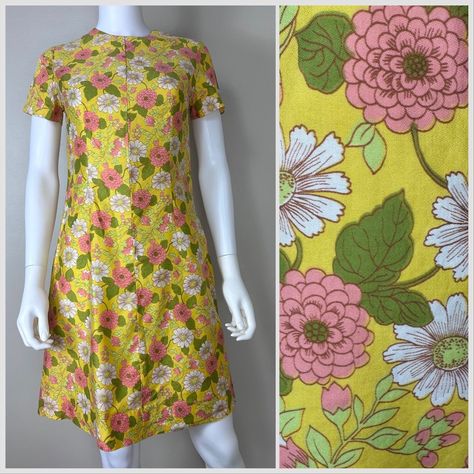 Sweet yellow and pink floral short sleeve dress from the 60s. I read that VHY Hawaiian Textiles were only produced in the 50s and 60s. It has a metal zipper up the center back  Brand - I think the dress is handmade from VHY Hawaiian Textiles fabric Content - feels like cotton Size - approximately a modern Small but please check all measurements to ensure fit Shoulders - 14" across Chest - 17.25" pit to pit  Sleeves - 7" Waist - approximately 15.25" across Hips - approximately 19.75" across Lengt