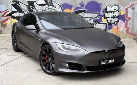 Tesla Model S wrapped in 3M Satin Dark Grey Tesla Wrapped, Tesla Model S Custom, Tesla Wrap, New Model Car, Tesla Electric Car, Car Tattoo, Grey Car, Aesthetic Cool, Aesthetic Car