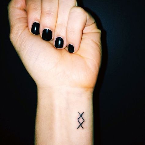 Even small tattoos are a large decision. And despite the size small tattoos can make a statement. We've put together a list of the best small tattoos with deeper symbolic meanings. #top5 #topfive #tattoo #tattooart #tattoodesign Tiny Tattoos With Meaning, Tattoo Word, Latest Tattoo Design, Unique Small Tattoo, Shape Tattoo, 4 Tattoo, Small Tattoos With Meaning, Meaningful Tattoos For Women, Latest Tattoos