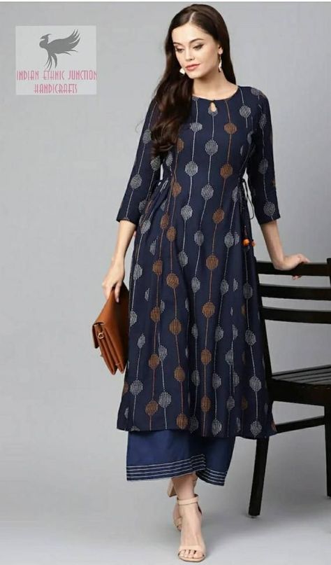 7c4ede33a62160a19586f6e26eaefacfdesc53267951ri A Line Kurti Designs, Printed Kurti Designs, Cotton Dress Pattern, A Line Kurti, Wrap Tops, Kurta Patterns, Elevated Casual, Kurta Style, Simple Kurta Designs