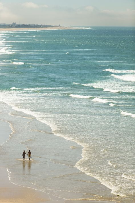 A couple walk on the beach at Conil de la Frontera, in Andalucia. Costa De La Luz, Cadiz, Beach Walk Couple, Walking By The Beach, Ear Acupressure, Couple Walking On The Beach, Couple At The Beach, Couple Walk, Walking On Beach