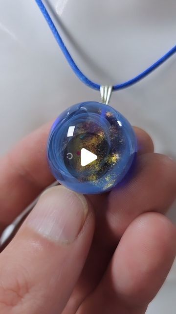 Daniel Cooper on Instagram: "Creating A Galaxy Necklace.  Full Tutorial coming soon with all questions answered, be sure to sub to my YouTube and hit that notification bell 🔔.   I have seen these resin art galaxy pendants a few times but have never tried until now.  These are my first two attempts.  They make beautiful jewelry pendants 😍  Resin art, jewelry making, resin, jewelry inspo, necklace ideas, galaxy, galaxy jewelry  #resinart #resin #jewelrymaking" Resin Galaxy Art, Uv Resin Pendants, Resin Jewelry Making Diy Tutorial, Epoxy Resin Earrings Diy, Uv Resin Jewelry Ideas, Necklace Pendant Ideas, Epoxy Jewelry Diy Ideas, Resin Necklace Ideas, Resin Pendant Ideas