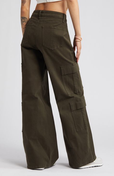 A plethora of cargo pockets lends utilitarian-inspired appeal to high-waisted pants fashioned in a wide-leg silhouette. 32" inseam; 25 1/2" leg opening; 10" front rise; 15" back rise 98% cotton, 2% spandex Machine wash, tumble dry Imported Feminine Utilitarian Fashion, High Waist Cargo Pants Outfit, High Waisted Cargo Pants Outfit, Wide Leg Cargo Jeans, High Waisted Cargo Pants, Cargo Pants Outfit, Green Cargo Pants, Black Femininity, Green Pants