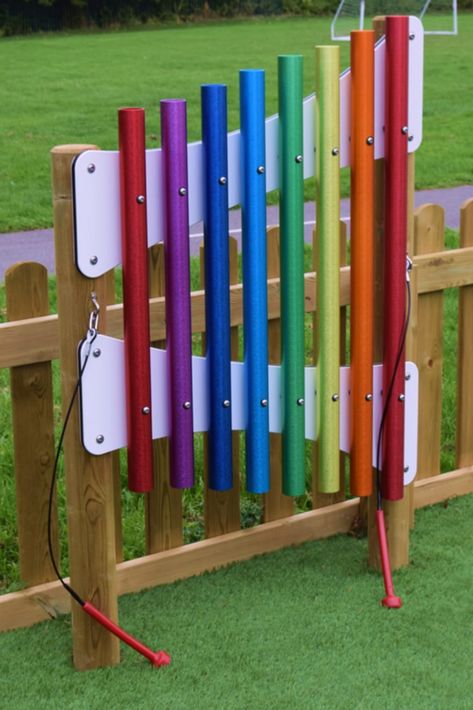 Sensory Fence Ideas, Outdoor Musical Playground, Outdoor Sensory Wall Fence, Diy Music Wall Outdoor, Outdoor Music Wall For Kids, Outdoor Sensory Wall, Outdoor Music Wall, Childrens Play Area Garden, Outdoor Music Area