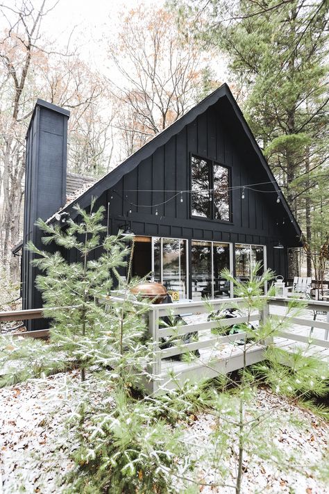 Our Wisconsin Chalet Style Cabin #cabin #chalet #Wisconsin #aframe #blackcabin #black #cozy #northwoods Charcoal A Frame House, Country Cabin Exterior, Cabin Style House Exterior, Black Cabin In The Woods, Modern Mountain Cabin Exterior, Mountain Cabin Modern, Chalet Exterior Design, Black House In The Woods, Black Lake House