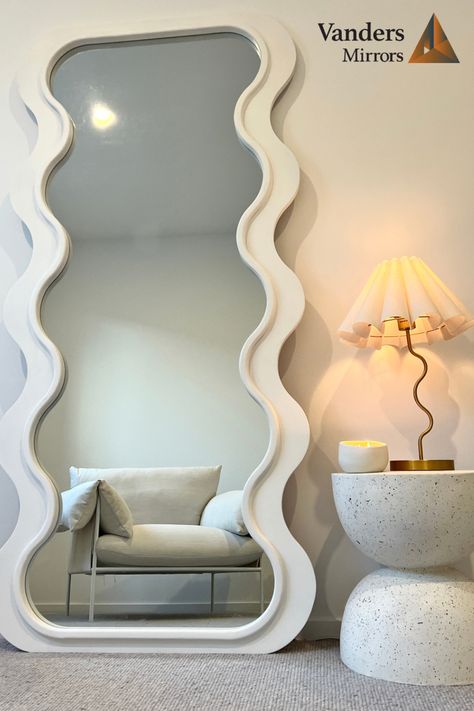 Wavy mirrors, curved mirrors or odd shaped mirrors are taking over and doubling as art within the home. These mirrors create a unique but calming environment in your home and are a must have piece in 2023. #mirror #wavymirror #curvedmirror #bathroomreno #bedroomreno #fashion #salon #hairsalon #aesthetic # Squiggly Mirror, Curvy Mirror, Fall Apartment Decor, Mirror Decor Living Room, Chambre Inspo, Esthetician Room Decor, Curved Mirror, Wavy Mirror, Mirror Inspiration
