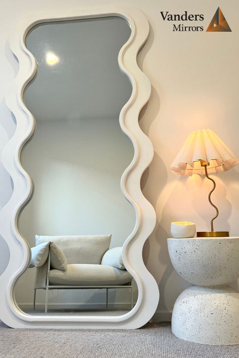 Wavy mirrors, curved mirrors or odd shaped mirrors are taking over and doubling as art within the home. These mirrors create a unique but calming environment in your home and are a must have piece in 2023. #mirror #wavymirror #curvedmirror #bathroomreno #bedroomreno #fashion #salon #hairsalon #aesthetic # Curvy Mirror, Mirror Decor Ideas, Esthetician Room Decor, Curved Mirror, Wavy Mirror, Esthetician Room, Mirror Inspiration, Aesthetic Room Ideas, Rooms Ideas