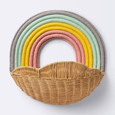 Add whimsical charm to your kid's space with this Hanging Wall Storage Rainbow Basket from cloud island™. Showcasing a rainbow-like base, this storage basket has cloud-like accents to create a lovely display that suits their decor. It's designed with a mix of rattan and fabric to lend mixed material appeal. Simply hang this rainbow storage basket on the wall to store their toys, balls and other small items, and add a vase, rainbow plush toy and wood decorative sculptures for a charming decor set Nursery, Hanging Wall Storage, Rainbow Basket, Cloud Island, Wall Storage, Hanging Wall, Storage Basket, Target, Drive