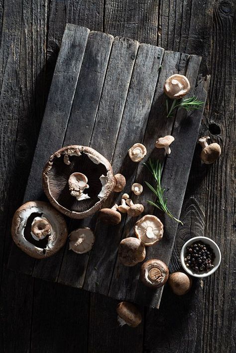 Raw mushrooms with fresh herbs on a rustic distressed wood surface. I license this photo as a stock photo – click the image for licensing options. | Nicole Branan | Rustic Farmhouse Style Food Photography | #stockphoto #stockphotography #foodphotography #foodstyling #rusticfoodphotography Essen, Food Photography Lighting Setup, Rustic Food Photography, Healthy Food Photography, Food Photography Lighting, Food Photography Dessert, Food Photography Composition, Food Photography Background, Rustic Photography