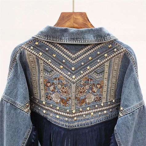 Oversized Bohemian Style Denim Jacket With Gold And Silver Studded Accents, Navy Faux Suede Fringe And Neutral Floral Embroidery On The Backside. Prewashed Denim. Light Denim Color Also Listed! One Size Fits Most Recommended For Sizes: 2, 4, 6, 8, 10, 12, Small, Medium, Large And X-Large Armpit To Armpit: Approx. 24 1/2" Length Shoulder To Hem: Approx. 25 1/2" Vintage Outerwear, Tassel Embroidery, Hippie Jacket, Demin Jacket, Boho Denim, Embroidered Denim Jacket, Jean Vintage, Boho Jacket, Long Sleeve Outerwear