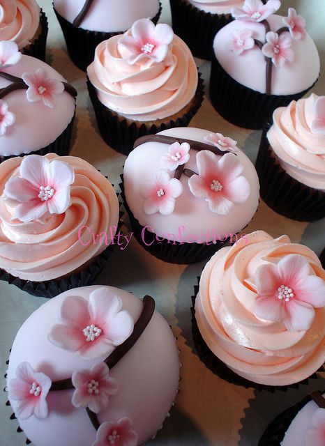 Cherry Blossoms- A few years ago we had a bride who didn't want a lot of frilly flowers.  Her colors were chocolate and pink.  We decorated with the branches and blooms.  This would've been a fabulous addittion. Cherry Blossom Party, Cupcakes Design, Cherry Blossom Cake, Cherry Blossom Theme, Spring Wedding Cake, Cherry Blossom Wedding, Beautiful Cupcakes, Cupcake Designs, ดินปั้น Polymer Clay