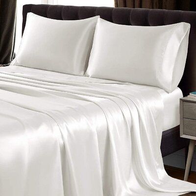 The satin bed sheets silky soft against your skin can help your skin maintain its natural moisture, which helps prevent dry skin and facial wrinkles throughout the night. Satin pillow cases also create less friction to protect your hair to keep tangle and frizz-free, perfect for curl and dry hair. Size: King, Color: Ivory White | vaststudy Microfiber Sheet Set Polyester in White, Size 102.0 H x 102.0 W in | Wayfair Silky Bedding, Satin Bed Sheets, Satin Bed, Silk Bed Sheets, Silk Bedding Set, Queen Bed Sheets, Old Sheets, Best Bedding Sets, Silk Sheets