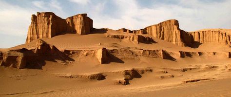 Deserts make up about a quarter of Iran's land. The Dasht-e Lut with an area of over 40,000 square kilometers, is one the most famous deserts of Iran.  #hipersia #tour #travel #iran #desert #lut Nature, Lut Desert Iran, Desert Rock Formations, Iran Desert, Desert Cliff, Taklamakan Desert, Desert Rocks, Desert Biome, Desert Land