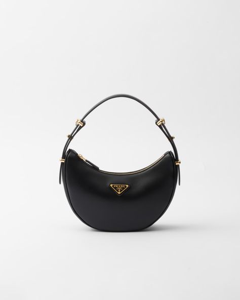 Black Prada Arqué Leather Shoulder Bag | PRADA Black Prada Shoulder Bag, Prada Leather Shoulder Bag, Prada Arque Bag, Prada Moon Bag, Prada Black Bag, Black Prada Purse, Prada Bag Aesthetic, Black Prada Bag, Prada Hobo Bag