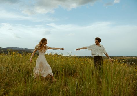 Meadow Couple Aesthetic, From The Daisies Photography, Wildflower Couples Photoshoot, Couple Photoshoot With Guitar, Cottagecore Photoshoot Couple, Meadow Photoshoot Couple, Whimsical Couples Photoshoot, Family Photoshoot In Field, Couple Posing Prompts