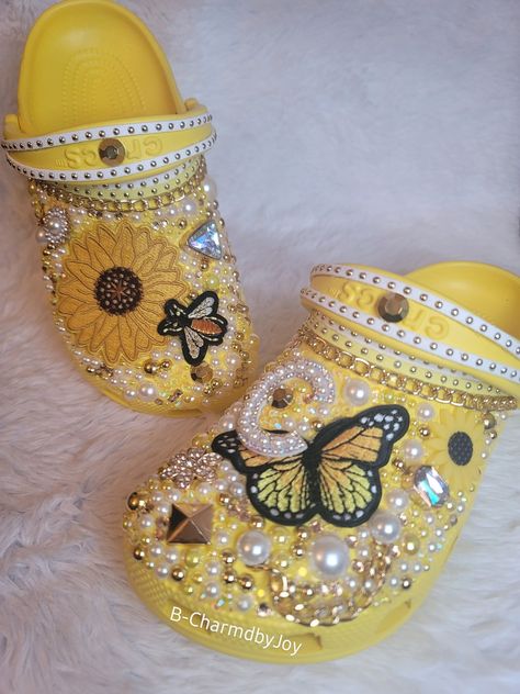 This Clogs item by BCharmdbyJoy has 172 favorites from Etsy shoppers. Ships from Birmingham, AL. Listed on Apr 30, 2024 Yellow Bedazzled Crocs, Blue Crocs With Jibbitz, Bedazzled Crocs Shoes, Badazzel Ideas, Croc Design Ideas, Patches On Shoes, Customized Crocs Shoes, Croc Outfits Women, Blinged Crocs