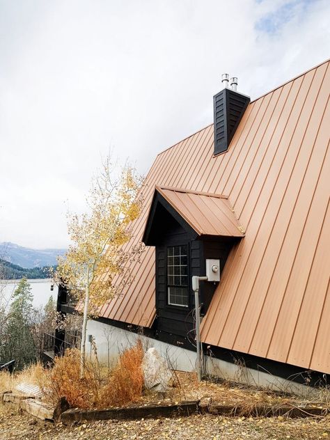 Our Freshly Painted Black A-Frame - Chris Loves Julia Copper Metal Roof House Exterior Colors, Black House Silver Metal Roof, Black House Metal Roof, Cabins With Metal Roofs, Black House Copper Roof, Copper Roof House, Rustic Mcm, Copper Metal Roof, A-frame Interior