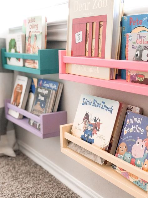 Our Playroom Tour (On a Budget) - Her Happy Home. #playroom #playroomorganization #playroomideas #kidsplayroom Playroom Colorful, Theme Playroom, Playroom Ikea, Bright Playroom, Book Ledges, Home Playroom, Shelves Ikea, Storage Playroom, Organization Playroom