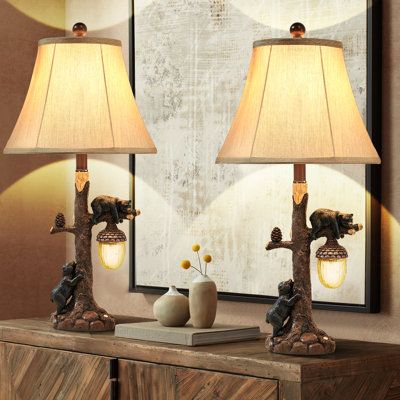 Unique Shape: This vintage chic resin table lamp with two realistic bears and a cute cone is perfect for your rustic, European vintage style cottage or apartment. | Millwood Pines Lorain 3-Way Resin USB-A / C Table Lamp Resin / Fabric in Brown / White | 26 H x 13 W x 13 D in | Wayfair Farmhouse Lamps Bedroom, Rustic Bedside Lamps, End Table With Lamp, Cabin Rooms, Woods Cabin, Bedside Lamps With Usb, Resin Fabric, Rustic European, Lamp Brown