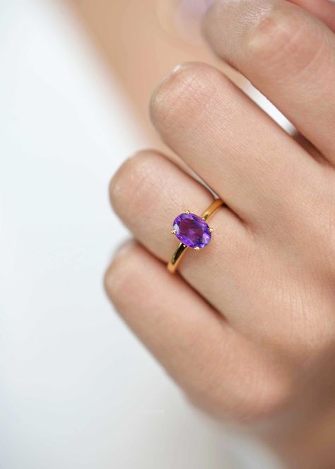 Our Dark Amethyst ring features a single deep purple genuine amethyst set in a four-prong setting on a 2mm gold vermeil band. A classic style that will stand the test of the time and is perfect for stacking. DETAILS * Dimension - Oval Stone - 8mm x 6mm Diameter, band width - 2mm * Materials - 18k thick gold vermeil over sterling silver, natural genuine dark purple amethyst stone * RING SIZER - If you have any questions about the stone or the ring size, please don't hesitate to send me a dm. If y Purple Stone Rings, Dark Amethyst, Custom Jewelry Box, Amethyst Set, Purple Amethyst Ring, Purple Rings, Box Making, Fancy Jewellery, Vermeil Jewelry