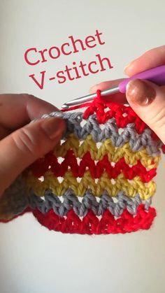 The V-stitch is an easy stitch for many uses. Step by step tutorial in the link. Use the V-stitch for crocheted blankets, scarfs, pillows, afghans, cardihans, ponchos etc. In the V-stitch you group double crochets. Crochet stitch tutorial. #crochet #crochettutorial #vstitch #crochetstitches V Double Crochet Stitch, Crochet Y Stitch, Baftani Dresses, How To Crochet The V Stitch, Bully Yarn Crochet Patterns, V Stitch Blanket Crochet, Triangle Crochet Stitch, Crochet V Pattern, How To Crochet V Stitch