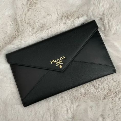 classy timeless Prada saffiano leather black clutch wallet envelope style stylish new with tags nwt new condition gold hardware gold accents wallet slots wallet on chain woc back zip made in italy snap closure fits iphone fits phone fits android black leather saks fifth avenue elegant functional designer fashion womens women's fashion Prada Clutch, Leather Envelope Clutch, Prada Wallet, Leather Envelope, Clutches For Women, Envelope Sizes, Envelope Clutch, Clutch Wallet, Clutch Handbag