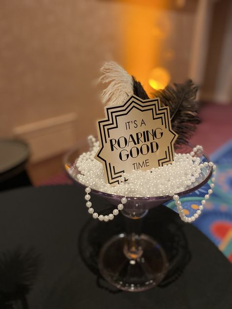 20s Themed Centerpieces, Roaring 20s Diy Decorations, Roaring 20s Dance Theme, Roaring 20s Party Centerpieces, Roaring 60s Party, Gatsby Centerpiece Ideas Roaring 20s, Roaring 20s Table Decor, Roaring 20s Nye Party, Pink Roaring 20s Party