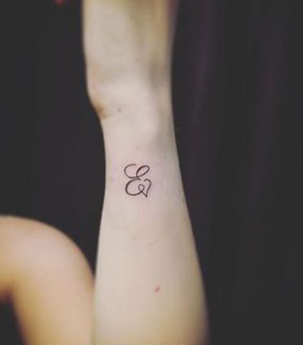 Expressive E Letter Tattoo E Letter Tattoo, Tattoo Ghost, Monogram Tattoo, Meaningful Wrist Tattoos, E Letter, Letter Tattoo, Initial Tattoo, Small Hand Tattoos, Name Tattoo Designs