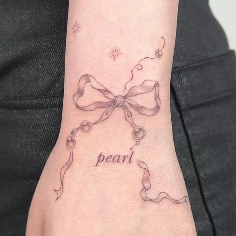 9 Adorable Bow Tattoo Ideas to Try for 2024 Dotted Bow Tattoo, Bow Leg Tattoo, Bow Tattoo Ideas, Bow Tattoos, Tribute Tattoos, Finger Tats, Bow Legged, Bow Tattoo, Cupcake Dress