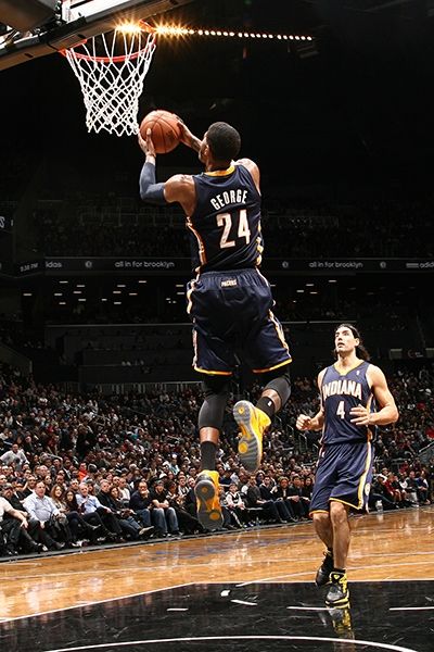 Paul George slams it home against the Brooklyn Nets on December 23, 2013. Derrick Rose, Paul George Nba, Star Poster, Indiana Basketball, Shooting Guard, Nba Art, Basketball Posters, Nba Pictures, Basketball Photography