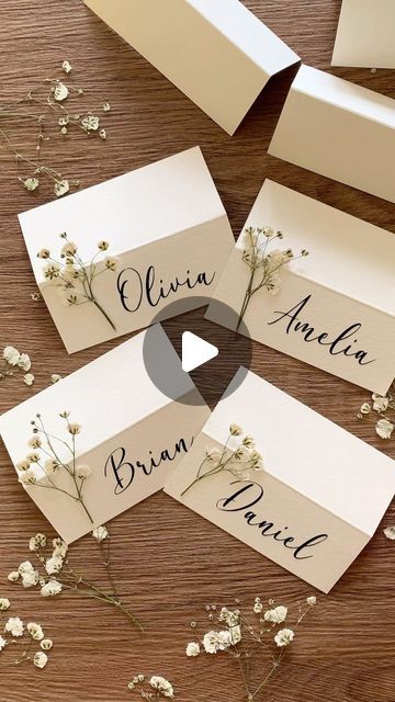 Pressed Flowers For Wedding Decor & Crafts | Cards & Frames on Instagram: "White Baby's breaths are timeless classic.🕊️ Beautifully incorporated into the placecards together with names crafted with Cricut.  Elevate your celebration with my pressed Baby's Breaths placecards. DM or Link in bio.♥️ . . . #pressedflowers#pressedflowerart#gypsophila#babysbreath#classic#weddingwaxseal#weddinginspiration #weddingideas#placecards#weddinginspo #weddingdiy#bridetobe#bride2024#ukbride#craftideas#diy#diyideas#weddingdecor#partyideas#babyshowerdecorations#bridalshowerdecor#bridalshowerideas" Wedding Name Place Cards Table, Simple Name Cards Wedding, Pressed Flower Name Card, Diy Name Cards Place Settings, Wedding Name Cards Diy, Cricut Ideas Wedding, Diy Wedding Name Cards, Diy Name Tags Wedding, Diy Name Cards Wedding