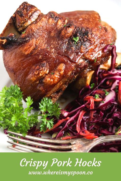 a crispy pork knuckle or hock served with red cabbage slaw Bacon Hock Recipes, Smoked Pork Hocks Recipe, Smoked Pork Hocks, Eisbein Recipe, Pork Leg Recipes, Pork Shanks Recipe, Ham Hock Recipes, Pork Crackling, Swiss Food