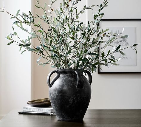 Faux Olive Branch | Pottery Barn (US) Dining Table Eucalyptus Centerpiece, Spring Floral Arrangements Centerpieces Table Decorations, Large Vase With Branches, Black Vase Flower Arrangement, Large Black Vase, Modern Dining Table Centerpiece Ideas, Big Vases Decor Living Room, Black Vase Decor, Dining Room Table Decor Centerpiece