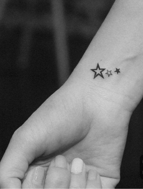 25 Stunning Mini Star Tattoo Ideas To Make You Shine - 206 Star Tattoos For Women On Wrist, Wrist Tattoos Stars, Star Tattoos Ankle, 4 Stars Tattoo, Star Tattoos For Women Beautiful, Mini Star Tattoo, Star Wrist Tattoo, Tiny Stars Tattoo, Kid Tattoos For Moms