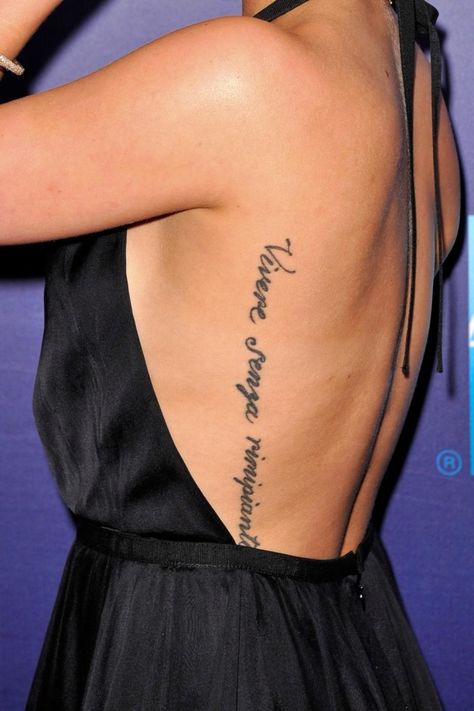 Hayden Panettiere.  Love the idea (minus the misspelling).  "Live without regrets" in Italian Hayden Panettiere, Side Tattoos Women Quotes, Vertical Tattoo, Side Tattoos Women, Tattoos On Side Ribs, Hunting Tattoos, Hand Tattoos For Girls, Tattoo Back, Japanese Sleeve Tattoos