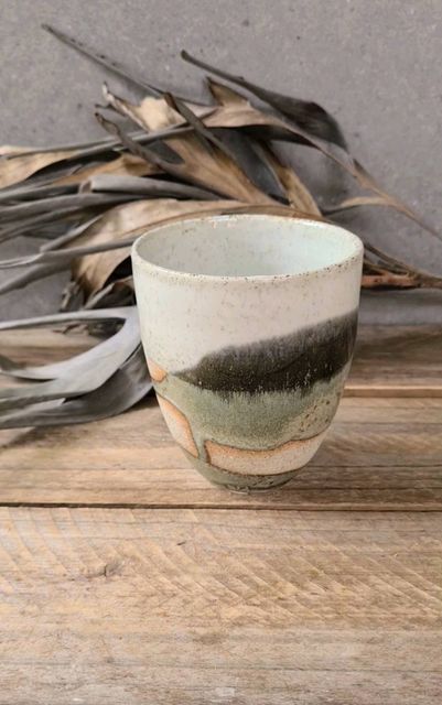 JK CLAY on Instagram: "LOVE MY NEW GLAZE This earthy green glaze is a new addition to my existing neutral range. I think it compliments my colours perfectly by still keeping the natural, earthy, calming look I strive for in my work. Love the blushing too where the glaze meets the clay. . . . #neutralcolours #earthiness #earthyceramics #newglaze #jkclay #madeinaustralia #wheelthrownpottery #happyoutcome #potterytumbler #coffeedrinker" Earthy Pottery Glaze, Natural Apartment, Ceramic Glaze Ideas, Earthy Pottery, Earthy Ceramics, Glaze Ideas, Pottery Inspo, Ceramic Glaze Recipes, Earthy Green