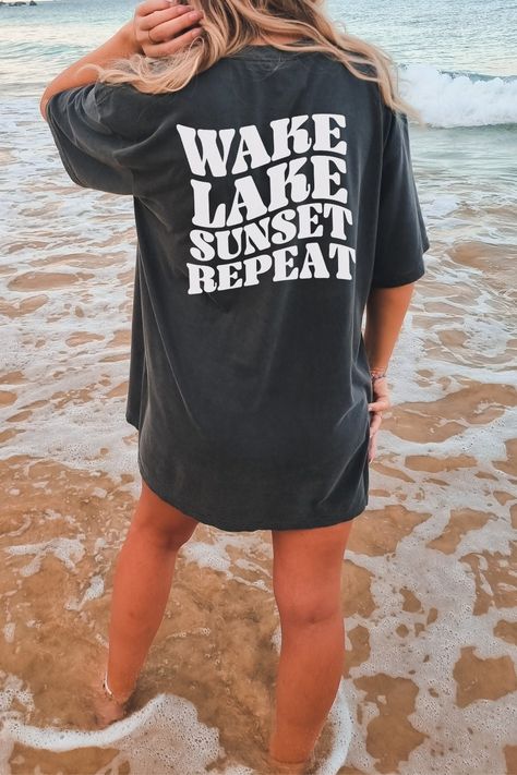 Wake Lake Sunset Repeat Shirt, Lake Lover Shirt, Gift For Lake Lover, Lake Life Shirt, Lake Vacation Shirt, Lake Shirt https://etsy.me/3Yz5nHG #lakelover #lakelovershirt #lakelife #lakevacationshirt #giftforher #lakegiftshirt #laketrip #laketshirt #lakevibesshirt Lake Life Apparel, San Jose, Lake Sayings For Shirts, Lake Tshirt Ideas, Lake T Shirts, Lake Sweatshirt Ideas, Lake Shirt Ideas, Summer Shirt Ideas, Lake Sweatshirt