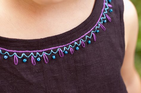 this would dress up a plain shirt Thread Embroidery Neck Designs, Embroidery For Neckline, Embroidery Around Neckline, Neckline Embroidery Pattern, Embroidered Neckline Designs, Thread Designs On Cloth, Tshirt Embellishment Ideas Diy, Simple Neckline Designs, Dhaga Work Design