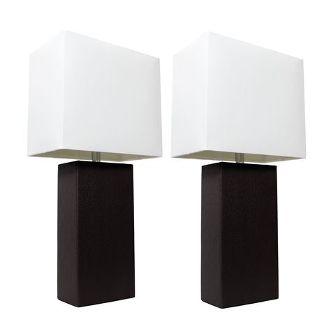 "Buy the Elegant Designs™ 2 Pack Leather Table Lamps with White Shades at Michaels. com. These fashionable table lamps, with their genuine leather bodies and white fabric shades, will add style and pizzazz to any room. We believe that lighting is like jewelry for your home. These fashionable table lamps, with their genuine leather bodies and white fabric shades, will add style and pizzazz to any room. We believe that lighting is like jewelry for your home. Our products will help to enhance your Living Room With Lamps, White Leather Living Room, Leather Lamps, Staging Furniture, Leather Table, Standard Lamps, Black Table Lamps, Table Lamp Sets, Traditional Lighting