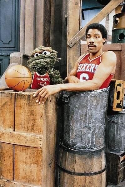 Julius “Dr. J” Erving appeared with Oscar the Grouch on a 1982 episode of "Sesame Street." Food Energy, Julius Erving, Dr J, American Athletes, Vintage Basketball, Oscar The Grouch, Hoop Dreams, Allen Iverson, Nba Legends