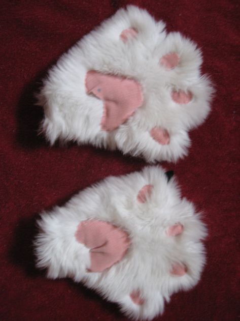 How to Make Cute Kitty Paw Mittens: These instructions will tell you how to make very cute amine style cat paws. I used them in a costume I made and they worked very well. They aren't bulky so you can still hold things. They cost under $5 to make and didn't take very long at all. I ... Diy Cat Tail Costume, Diy Cat Costume Kids, Kitty Soft Paws Costume, Diy Cat Tail, Halloween Costume For 3, Amine Style, Halloween Costume For Work, Work Group Halloween Costumes, Costume For 3