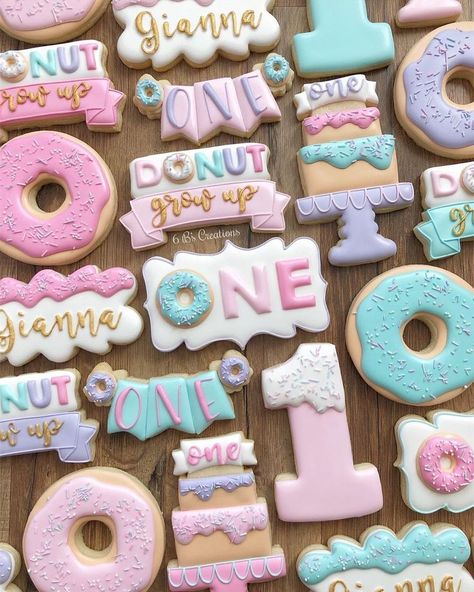 Brittany Geil on Instagram: “Donut Grow Up cookies for a first birthday!! I loved being able to put a girly spin on this cookie set I did last year! I didn’t have any…” Up First Birthday Party, Donut Grow Up First Birthday, Up Cookies, Doughnut Party, First Birthday Party Ideas, First Birthday Cookies, Donut Themed Birthday Party, 1st Birthday Party For Girls, Birthday Donuts