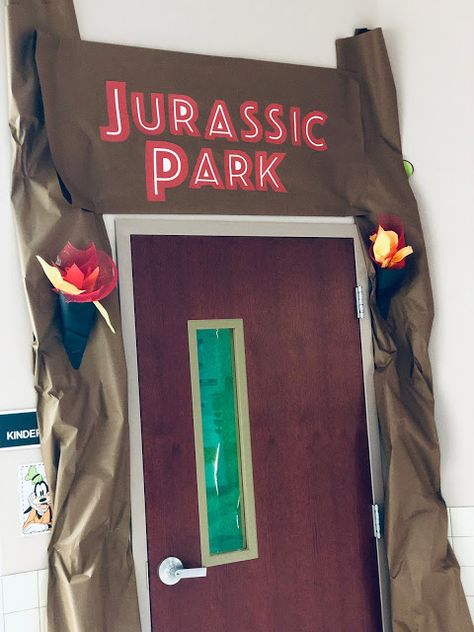 Scissors and Crayons: Jurassic Park Classroom Transformation Fossil Classroom Transformation, Jurassic Park Office Decor, Dino Themed Classroom, Jurassic Park Door Decoration, Jurassic Park Classroom Door, Dinosaur Theme Classroom Decorations, Jurassic Park Room Transformation, Dinosaur Room Transformation, Jurassic Park Activities For Kids